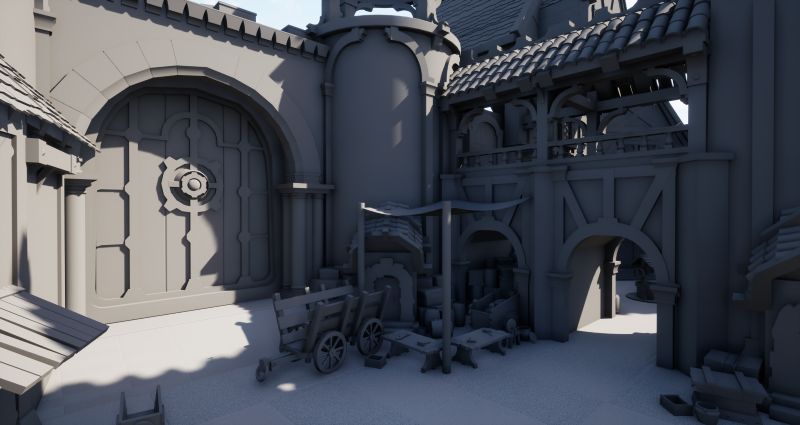 Gran portón con emblema de engranaje junto a carros, cajas y un toldo
