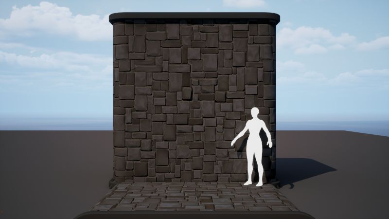 Material tileable de muro de piedra irregular en un cubo de prueba de UE5, con un maniquí de escala